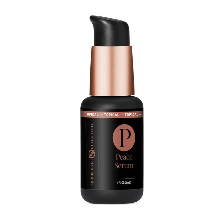 Black bottle with gold top 